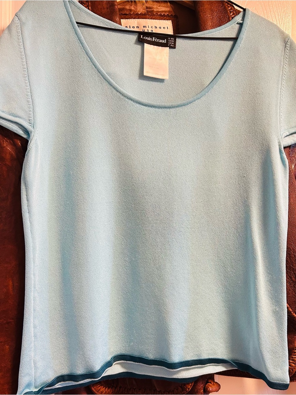 Louis Feraud Pale Blue Scoop Neck Short Sleeve Top. High quality fabrics. Soft